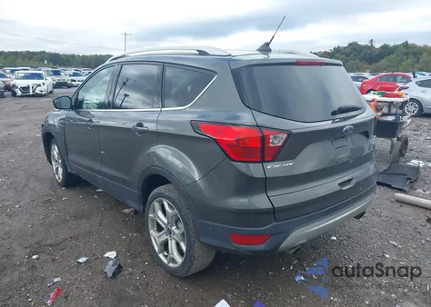 2019 Ford Escape Titanium из США, поврежденный, VIN 1FMCU9J9XKUB42852